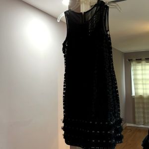 Beautiful little black dress with lots of detail